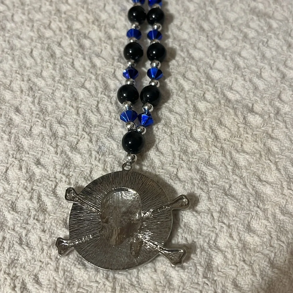 Halloween Skull and Crossbones Pirate necklace with beads.